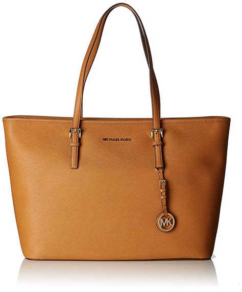 michael kors jet set travel commuter tote|Michael Kors bag with airplanes.